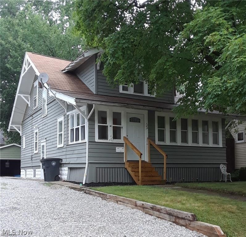 This charming Firestone Park duplex offers a great opportunity for investors seeking a property with both character and modern updates. Each unit features 1 bedroom and 1 bathroom with updated kitchens, bathrooms, and LVP flooring. The lower unit showcases beautiful original dark wood trim and a bright, versatile sunroom that adds extra living space and classic charm. Additional highlights include a detached two-car garage and a spacious unfinished basement with laundry hookups  Both units are currently occupied, providing immediate rental income potential.