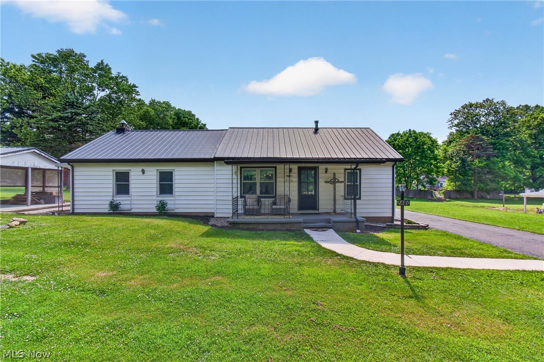 Welcome to this beautifully renovated two bedroom ranch home in the Tuslaw schools district. Thoughtfully designed with the potential to add a third bedroom to suit your growing needs. This charming residence features an open concept layout that seamlessly connects the living, dining, and kitchen areas, creating a bright and inviting space perfect for both everyday living and entertaining. The kitchen boasts newer cabinets, floating shelves and stainless steel appliances complemented by stunning quartz countertops, ideal for the home chef. Original hardwood floors add warmth and character throughout the home, preserving its timeless appeal. Both bathrooms have been fully renovated and the laundry was moved to the primary bathroom for convenience. Car enthusiasts will appreciate the spacious four car garage; a true mechanic’s dream, offering ample space for vehicles, tools, and projects. You'll get the best of both worlds with city utilities, yet tucked away in a desirable location close to highway access. Don’t miss the opportunity to make this exceptional property your new home!