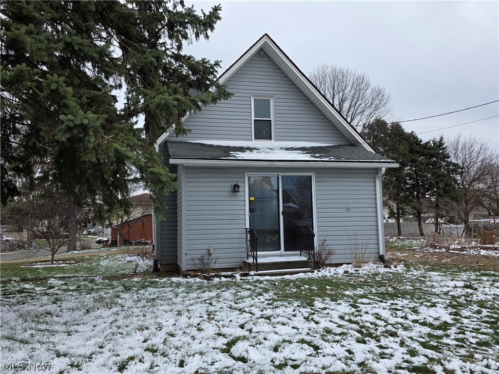 Cozy one bedroom bungalow.  Large bedroom with built ins on 2nd floor, full basement with a partial bathroom in the corner.  It has a first floor bathroom and large living room with a bonus room.  The large corner lot is made up of three parcels. With some TLC this house has many possibilities:  investment, starter home, or downsize.