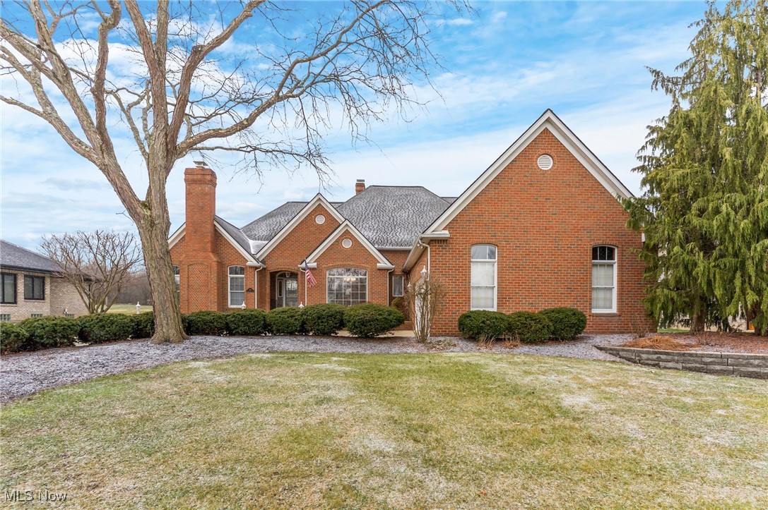 Welcome to 380 Shadydale in desirable Canfield! This stunning all-brick home offers 5 bedrooms and 4 bathrooms with flexible living space inside and out. A long concrete driveway leads to a heated 2.5-car attached garage, and inside you’ll find a welcoming entry with tile landing that flows to the spacious living and dining areas. The large living room features abundant natural light and a gas see-through fireplace into the family room with hardwood flooring. The eat-in kitchen boasts solid wood cabinetry, granite countertops, tile backsplash, large island with gas range, pantry pull-outs, double stainless ovens, and recessed lighting. Just off the kitchen is a bright sunroom with French doors, tile floor, shiplap ceiling, and patio access. The main level also includes first-floor laundry and half bath, a luxurious primary suite with patio access, double vanity, Jacuzzi tub, walk-in shower, and oversized walk-in closet, plus an office with vaulted ceilings, wood beams, fireplace, and large closet. Upstairs are three large bedrooms with walk-in closets and a full hall bath. The partially finished basement features a secondary living area, versatile bonus room with full bath and steam shower, plus excellent storage, perfect for a gym or workshop. Mechanical updates include two high-efficiency furnaces and A/C (2016), new hot water tank (2024), and 200-amp service with 100-amp subpanel. Outside, the backyard is an entertainer’s dream with a covered porch, patio with pergola, fenced inground heated pool with rubber coating, pump house and glass filter system, and a putting green for outdoor fun. The property also backs up to the Mill Creek MetroParks Bikeway, providing direct access to scenic trails for biking, walking, and more. Meticulously maintained with quality finishes and thoughtful upgrades, 380 Shadydale is a rare Canfield opportunity, don’t miss it!