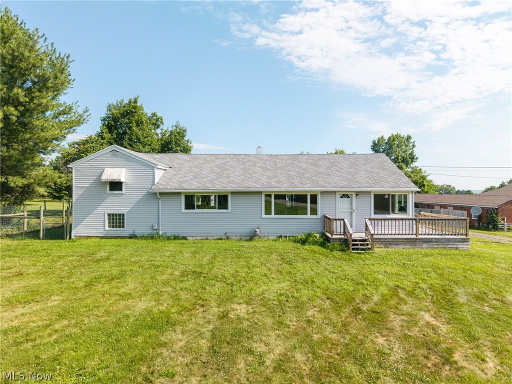Imagine a property that works as hard as you do - this three-bedroom, two-bath charmer delivers 1,624 square feet of thoughtfully updated living space with a versatile business zoning that opens doors most homes simply
can't. 
Convenience starts the moment you walk in. Main-level living means the primary bedroom and laundry sit right on the first floor, so there's no reason to haul baskets up and down stairs. Recent upgrades practically speak for themselves: new central air conditioning, a leaf-guard system to spare you those precarious ladder moments, fresh LVP waterproof flooring, a custom staircase, and updated windows brightening the living room, kitchen, and den. The kitchen also boasts a new range, microwave, and faucet, ready for your next culinary experiment.
Step outside onto brand-new decks and take in a generous, fully fenced lot with plenty of parking to spare. The real showstopper... A massive 1,860-square-foot, five-car garage/outbuilding wired with 220-amp service, new door openers, and a hardwired compressor - a dream workshop, storage haven, or launchpad for that home business the flexible residential B2 zoning encourages.
The setting sweetens the deal. Fleming Falls Preserve beckons nature lovers just up the road, Madison High School is close by, and everyday errands stay quick with a supermarket minutes away. Major highways keep the rest of the
region within easy reach.
Ready to blend home, hobby, and hustle under one roof? Schedule your private showing today and picture the
possibilities.