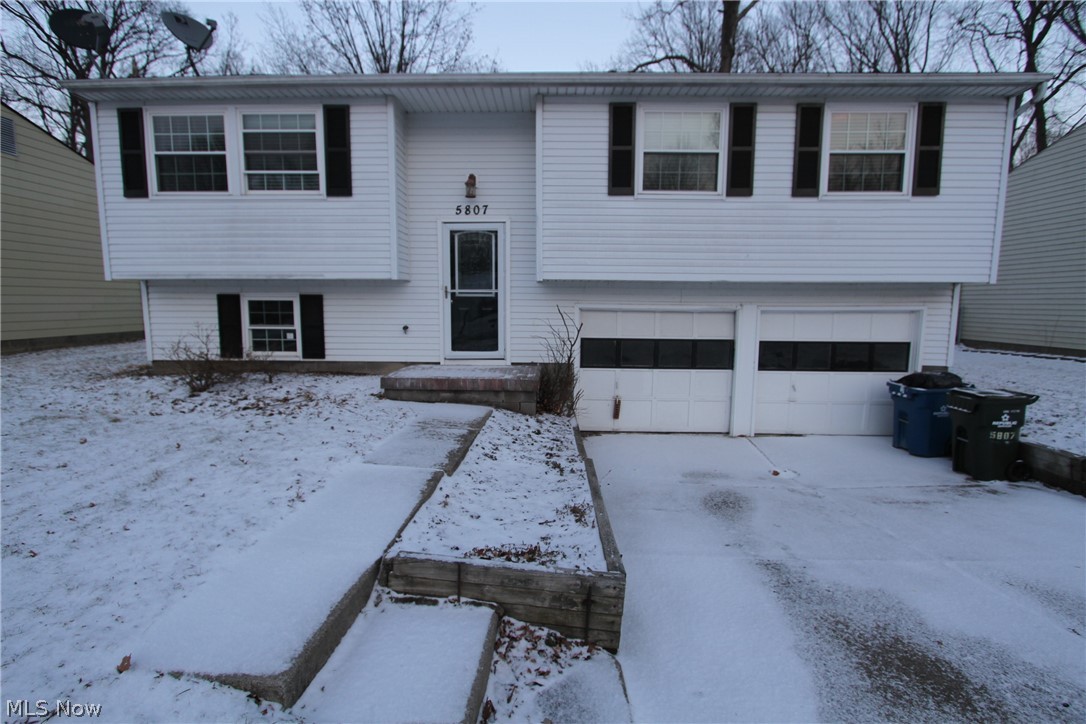 Completely remodeled Mentor on the Lake 3 bedroom, 2 full bath BI level on large lot. Kitchen with separate eating area.  Finished lower level with full bath. 2 car garage. Deck off the kitchen and fenced in backyard. Schedule your appt today! Won't last!