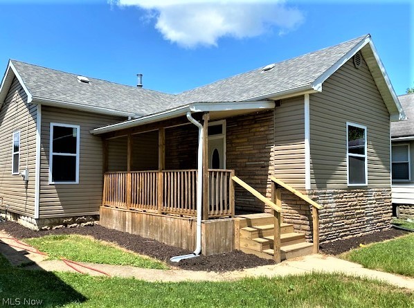 Charming remodeled one story home.  This home offers a master suite w/large master bath, 1st flr. laundry, 2nd bath and bedroom, rustic exposed brick wall in the dining area, all new kitchen w/new stove and microwave and island, nice size living room.  This home has been updated with newer vinyl, newer roof, new windows, new electric and plumbing, drywall, flooring and baths all new.  Backyard has nice deck for entertaining and privacy fencing in the backyard, covered front porch and parking in the rear of the property.