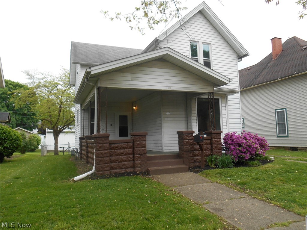 Lovely 2 story home with an inviting front porch, 3 bedrooms, 2 baths, fenced back yard, large detached 4 car garage and front and back off street parking. Improvements include: Electrical updates, newer flooring, windows, bathroom updates, exterior doors and custom window coverings. Clean and ready to move right in!