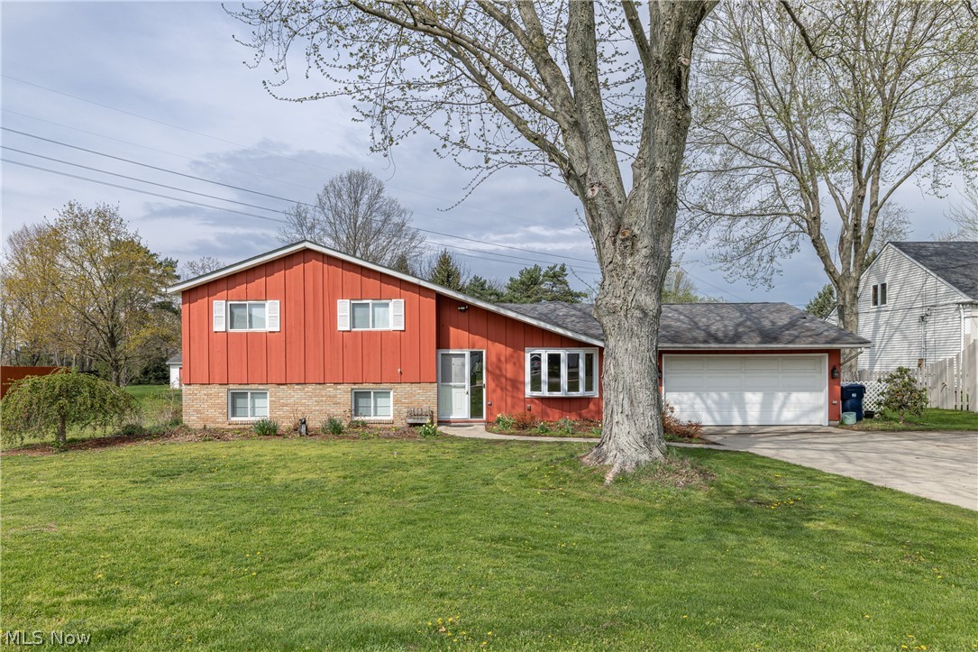 Welcome to this beautifully maintained 4-bedroom split-level home nestled in a desirable Avon neighborhood. Situated on over half an acre, this property offers a rare combination of space, comfort, and natural beauty. Step inside to find a bright and inviting layout filled with abundant natural light. The living room opens up to a nice sized eat-in kitchen. Off of the kitchen is a large sunroom, which provides a relaxing retreat with views of the expansive backyard. The home features two full bathrooms and a cozy gas fireplace in the downstairs family room, creating a warm and welcoming atmosphere year-round. Enjoy the outdoors on the patio overlooking the generous backyard, ideal for gatherings, gardening, or simply unwinding. Additional highlights include a tankless hot water heater for energy efficiency and convenience, as well as ample living space designed to fit a variety of lifestyles.
Don't miss the opportunity to own this charming home with room to grow, inside and out.