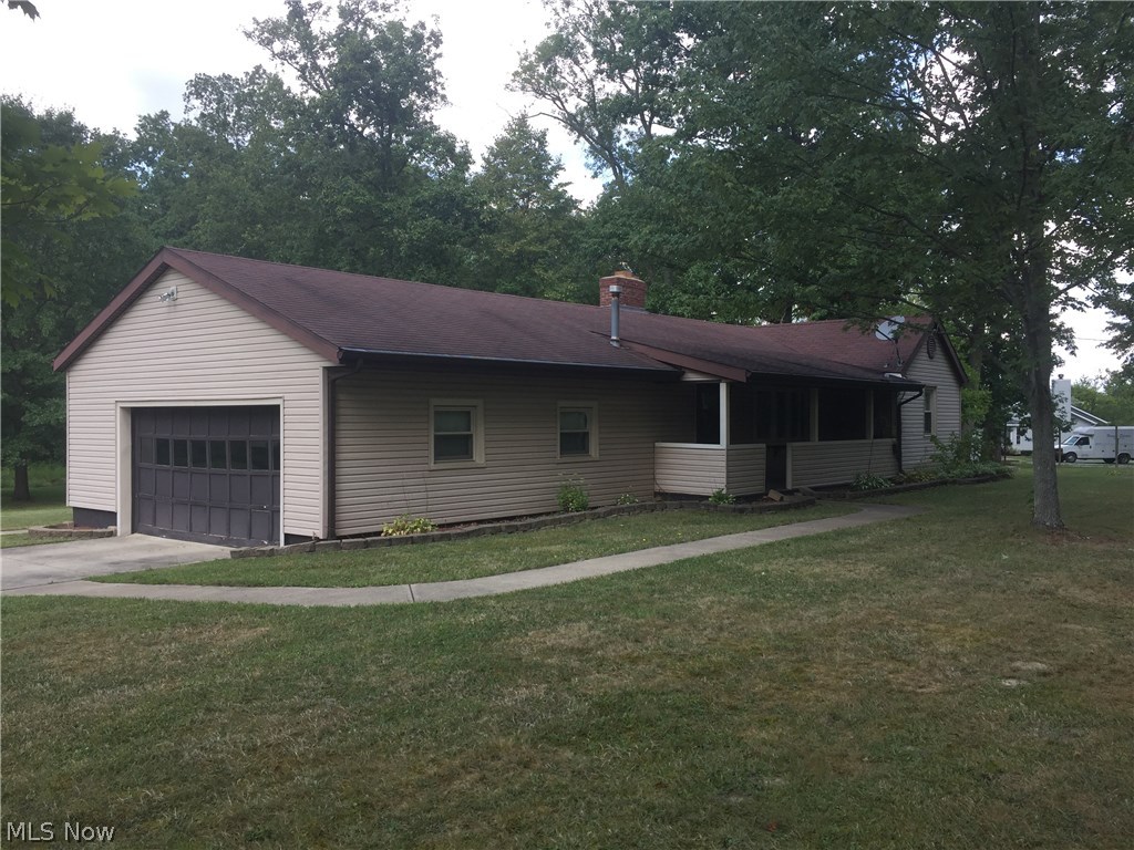 2.19 acres on a partially wooded lot in Sharon Township. The home currently has free gas. Very nice 32x48 outbuilding with upstairs storage. HMS Home Warranty. Possible third bedroom in the basement. The listing agent/broker is related to the seller.