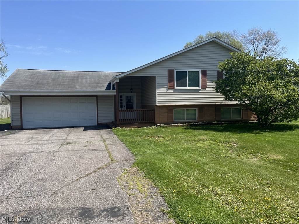 This property is being Sold by the Successor of the Guardian "As Is". It is listed as a Split Level but most of the living 
area is either on the upper level or the lower level. Middle level only has a breezeway room and a toilet room. So, let's start with the upper level: 3 Bedrooms, double sink bath, eat-in-kitchen, dining area and roomy living room. Lower level has an L-Shape family room, a 4th and a possible 5th bedroom or extra room for a playroom, sewing room or use as a storage room. Also, on this level is the laundry room/furnace room with a shower. Two circuit breaker boxes.  One in laundry room and the other in the family room downstairs. Large deep lot 245 feet. Garage is 22 by 22. Front wood deck porch. Back concrete Patio. Storage shed at the back of the property. Gas Heat. Central Air. Yes, it does need updating especially painting and flooring and maybe some minor work like removal of some wall -paper or dry-walling. But it is a solid built home in North Ridgeville School District, and it is located close to all main roads where you can cruise to shopping or zip to work. We are entertaining offers on this rather large family home.  Call for an appointment today to view and buy.