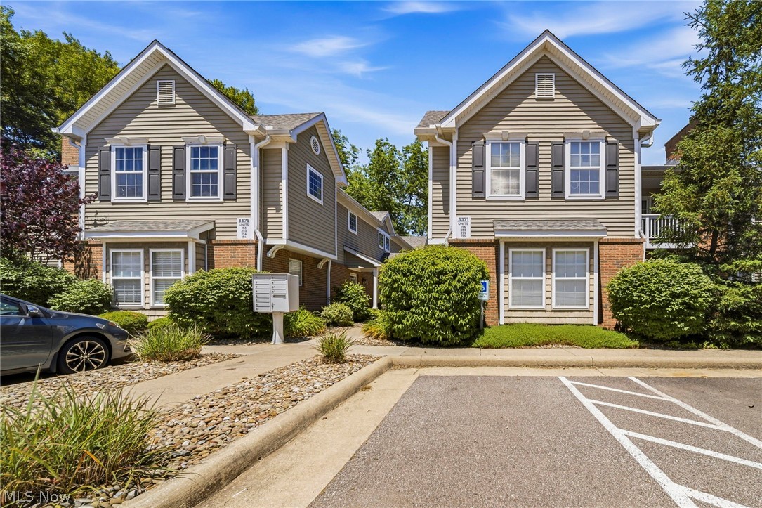 Welcome to easy first-floor living in Lenox Village. This 2-bedroom, 2-bath Fairlawn condo offers a comfortable, low-maintenance layout with thoughtful updates throughout. The living area features a gas fireplace and access to a private patio with green space, creating a relaxed setting for everyday living. The kitchen offers white cabinetry, granite countertops, stainless steel appliances that stay, and a spacious pantry/laundry area (washer/dryer are negotiable). Both bedrooms include walk-in closets, providing excellent storage, while additional storage closets throughout the unit add extra convenience. The bathrooms also feature granite countertops, adding a polished touch. A detached 1-car garage is included, and the building features cement slabs between floors for added sound control. Conveniently located near Fairlawn shopping, dining, parks, highway access, and within the Copley-Fairlawn City School District.