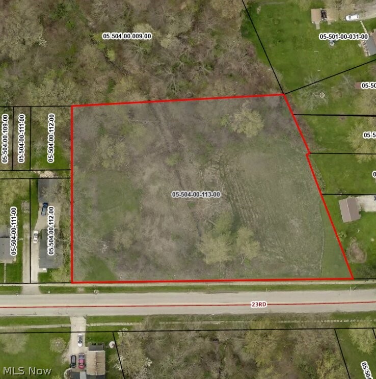 Rare Find - Serene Wooded Lot with Plenty of Frontage in the Heart of Ashtabula City. Imagine waking up to the sound of birdsong instead of city traffic, yet actually being in the heart of Ashtabula City. This unique property is over 1.5 acres of wooded land with a small creek and offers the ultimate urban paradox: Total privacy in an urban setting. Tucked away on a residential street, this undeveloped pristine parcel features a canopy of oak and maple trees toward the rear of the property, with a small creek in a tranquil setting. Whether you envision a modern home, or a charming custom home nestled off the road within the woods, or even an off the grid cabin, this is your blank canvas. Enjoy the best of both worlds....head down the road to historic Ashtabula Harbor for coffee shops, eateries, entertainment, beaches, boating, night life, and parks. Minutes from Lake Erie...don't miss this rare opportunity to build your dream home in one of the city's last remaining quiet spots. The creek has never flooded during the current owners tenure and utilities are available at the street. Adjacent to 1019 E 23rd St.
