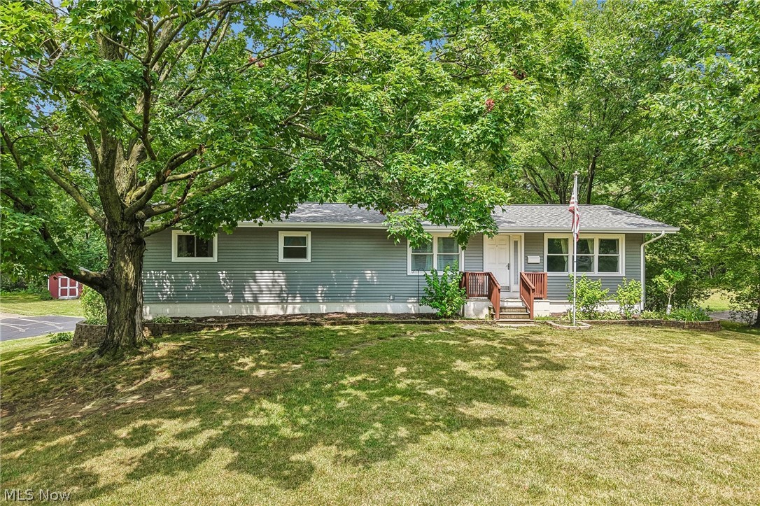 The listed price is a "Starting Price." The offer deadline is August 4, 2026 at 8:00 pm. The seller will consider offers at any time before the deadline. If the seller doesn't receive an offer that meets their "minimum" before the deadline, we will call for prospective buyers' highest and best offer. A home inspection, radon inspection, & appraisal have already been completed & are available upon request.

Welcome home to this spacious raised ranch, tucked into a highly regarded Solon school district, with easy access to three major highways!

The large living room is anchored by a striking wood beam ceiling and large windows at both ends that flood the space with natural light.

The kitchen offers stainless steel appliances and a dining area complete with built-in shelving, perfect for everyday meals or entertaining.

Four large bedrooms highlight hardwood floors and multiple windows. The full bathroom highlights double sinks and completes the main level.

Downstairs, the finished basement adds 780 square feet of additional living space, including built-in storage, a kitchenette with cabinetry, and a second full bathroom. A walkout leads directly to the patio, seamlessly connecting indoor and outdoor living.

Outside, enjoy a brick patio off the finished basement ideal for relaxing or entertaining. The lovely .55-acre yard includes a small storage shed, and a large driveway with a turnaround that offers plenty of parking.

Recent updates provide peace of mind, including a new AC unit (2024), new siding (July 2026), and a new roof, gutters and downspouts (May 2026). An attached two-car garage adds even more convenience.

This move-in ready home combines space, comfort, and an unbeatable Solon location.
