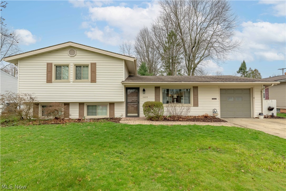 Welcome home to this beautiful updated split-level located just minutes from University of Mount Union in Alliance. This move- in -ready property offers the perfect blend of comfort, style, and convenience. Step inside to find a bright and inviting layout featuring numerous recent updates throughout. The updated kitchen is a true highlight with newer white cabinets, granite counters, backsplash and stainless appliances. The family room has large windows for extra lighting and open foyer concept with updated wooden flooring. This leads into the dining area and kitchen all on main floor. Upstairs is the 3 spacious bedrooms and full updated bathroom, with extra linen built ins. The lower basement level has living area with extra storage area. Next to the living area is the laundry room, utility room with additional bathroom and walk out stairs to backyard. The backyard is nicely fenced with new shed for extra storage space and deck and patio area. So many updates include: New Windows, shed, new paint throughout home, kitchen remodel, new flooring, HWT 2022, new lighting, Roof approx 10yrs old. Driveway 2020. This and so much more. Don't miss this opportunity. Schedule your private showing today!