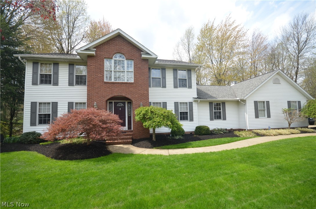 Get ready for this - MOVE IN READY Colonial in Bentley Place with all the UPDATING ALREADY COMPLETE!!  You are welcomed into the home's wide foyer with a Living Room to the left and a Dining Room to the right that is currently set up as a fantastic Bar Area.  The back part of the house is wide open offering a large Family Rm w/ Fireplace that leads to the huge Eat In Kitchen - all of these rooms overlook the private backyard and large Patio.  Down the hall from the Kitchen is the 4th Bedroom or a fantastic Office, a Full Bath and a Large Laundry Room.  Upstairs you will find the vaulted Master Bedroom and spacious Master Bath along with 2 more Bedrooms and a very large Full Bath off the hallway.  The Basement is set up ideally with a 29 x 15 Rec Room and another 14 x 13 Finished Room while still allowing the entire back half of the basement to be ready for storage or even the option of enlarging the finished basement.  The exterior of the home is on par with the inside with fantastic C
