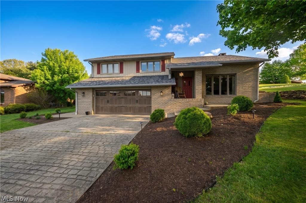 Back on market due to NO FAULT OF THE HOME! 
Welcome home to this 3 bed 3 bath home in a desirable neighborhood, close to Buckeye Career Center and Kent State University. This home has just had all new professional landscaping done, adding beautiful curb appeal. Step inside to a cozy living room with a large window and high vaulted ceilings. The kitchen is spacious with plenty of cabinet space and appliances that will stay with the home. The dining room has a sliding glass door leading to a back patio where you can sit and relax on the back porch overlooking your large .35 acre lot. The master bedroom is spacious and has its own bathroom with newer flooring. There are two more bedrooms and a full bathroom that complete this floor. The lower level has another living room, a full bathroom, and a laundry room with the washer and dryer that will stay.  The garage is oversized that gives extra space for a gym or a workshop space. Out back there is plenty of room for kids and pets to room and extra storage in the shed. Major updates include a new roof in 2023, new electrical box and all new breakers in 2023, new carpet in 2026, new bathroom floor 2026, radon system installed 2022. This home is ready for you to make it yours!
