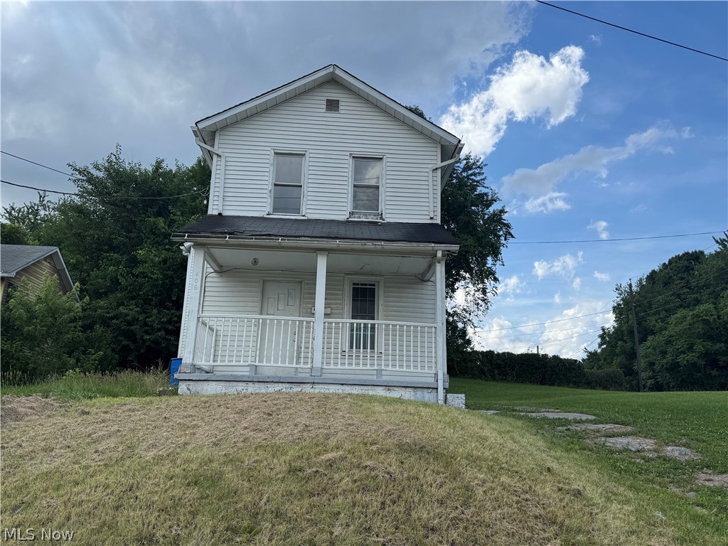 This classic two-story home offers plenty of potential for the right buyer looking to renovate and restore. Situated on a spacious lot, the property features a covered front porch, generous yard, and a functional layout ready for your vision. Whether you’re an investor, flipper, or homeowner seeking a renovation project, this property presents an excellent opportunity to build equity. Property is being sold as-is. Bring your ideas and transform this home into something special!
