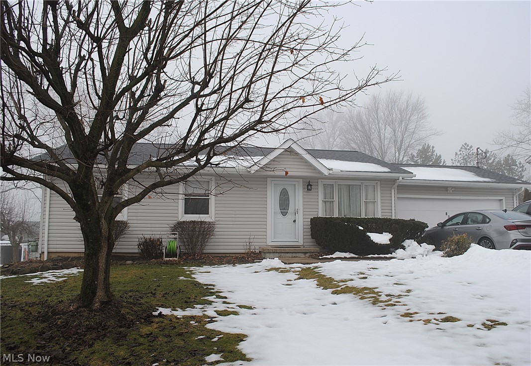Wonderful Ranch style home in a desired location is certain to impress.  Warm living room opens to kitchen with plenty of cabinet and counter space.  Kitchen opens to large family room with fireplace and sliding door out to deck.  Primary bedroom with half bath.  All bedrooms offer good closet space.  Full unfinished basement provides loads of storage and could easily be finished for recreation room.  All appliances stay.  Double wide driveway with additional parking pad provides plenty of parking.  Deck overlooks fenced yard and is the perfect place to enjoy the outdoors.  Close to schools, shopping and recreation.  Call agent today.