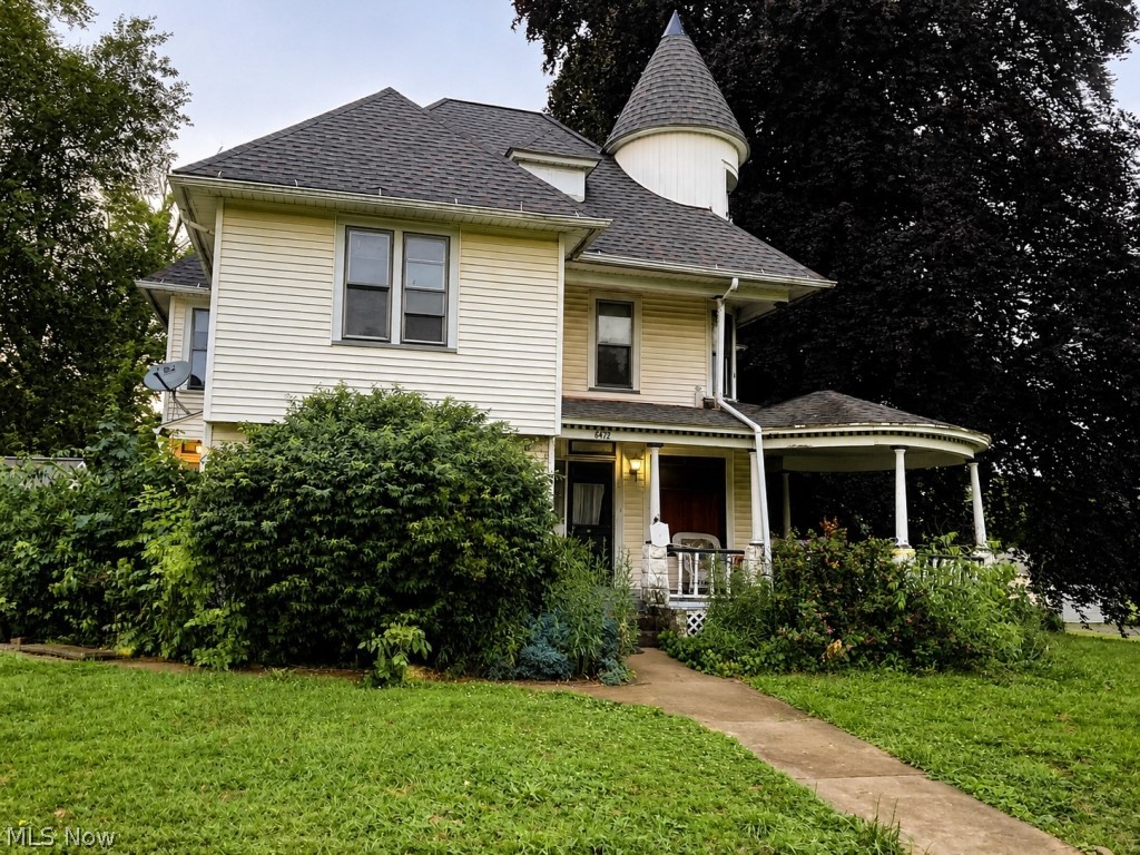 Priced for condition and being sold as-is, renovation required. This 1900-built house in the South Range School District sits on .82 acres with original hardwood floors, pocket doors, a wrap-around porch, built-in kitchen cabinetry, four bedrooms, two full baths, first-floor laundry and a 3-car garage. Opportunity to restore and update while preserving original character.