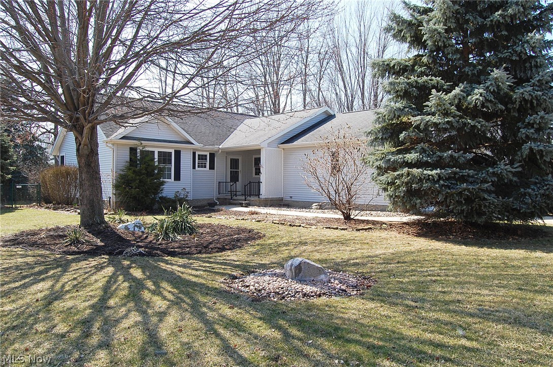 Prepare to “MOVE” right into this charming Eastlake Ranch nestled on a corner lot in sought after Garrett’s Cove. The classic open living room and dining room beckon the gathering of friends and family. The eat-in kitchen is light and bright with a vaulted ceiling.  Newer appliances, ample cabinets and abundant counter space make this kitchen a home chef’s dream. Spend your quiet hours in the classic master suite boasting a large walk in closet and an ensuite bath. There are two additional generously sized bedrooms and another full bath with walk in shower.  The change of seasons will not get you down when you can watch from the panoramic views of the light filled sun room. Just sit back and take in the breeze on summer afternoons out on the private, concrete patio.  Let your imagination be your guide with possibilities for the 8 ft high unfinished basement, with plenty of room for all types of enjoyment.  Updates include: Newer windows, flooring, furnace, garage door.  House prewired