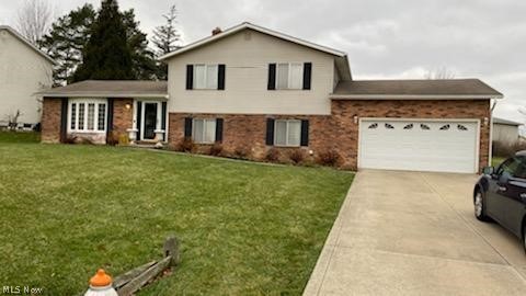 Wonderful Split-level W/Attached 2 Car Garage! Nice Eat-in Kit W/Dishwasher, Disposal & Wood Cabinets. Living Room and Dining W/Neutral Carpeting, Newer Window & Sliders Leading Out To Backyard Deck. Family Room Spacious,  Nice size Master Bedroom. Lots of storage space. Must See!!!