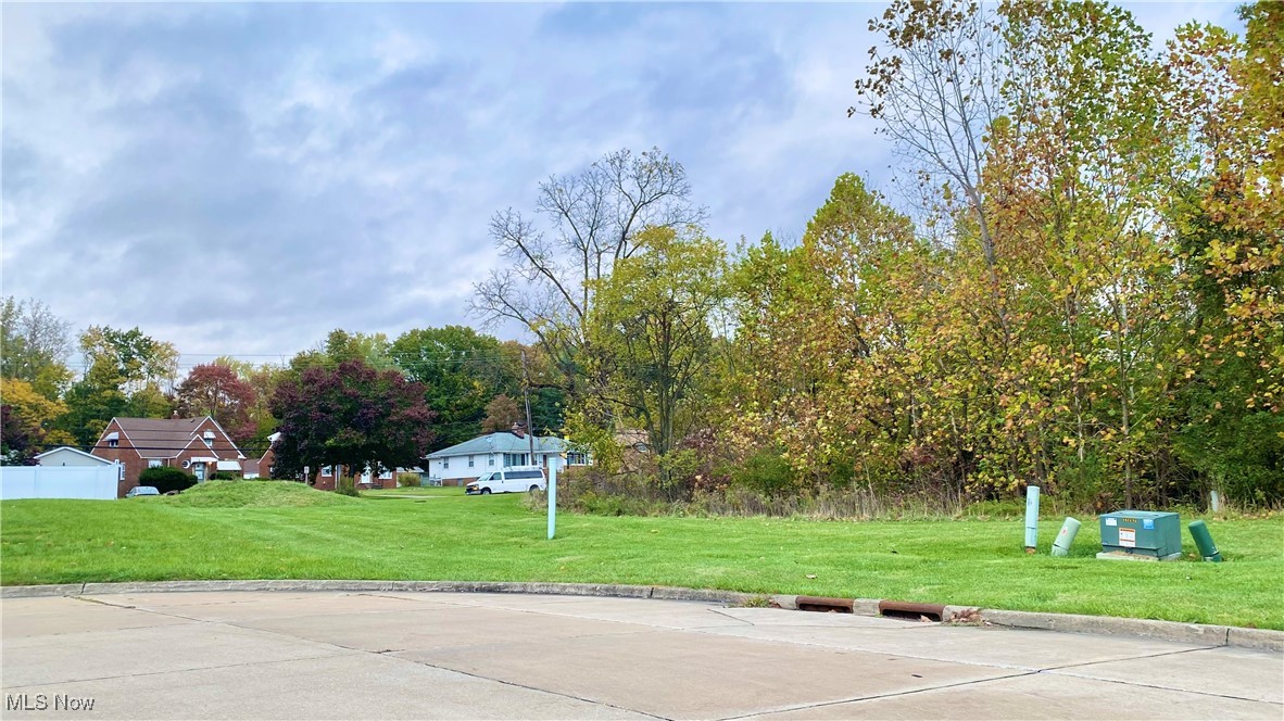 Located in one of the area's premier developments, Valley Ranch Estates - this lot is located on a private cul-de-sac and is ready to build!  Water/Sewer connections at the curb as well as underground utilities ready to connect.  Maple Heights offers tax incentives for new construction!  Builders available to draft your dream!  This charming development is within walking distance of parks and shopping.  Within minutes of the Cuyahoga Valley National Park, highways and more.