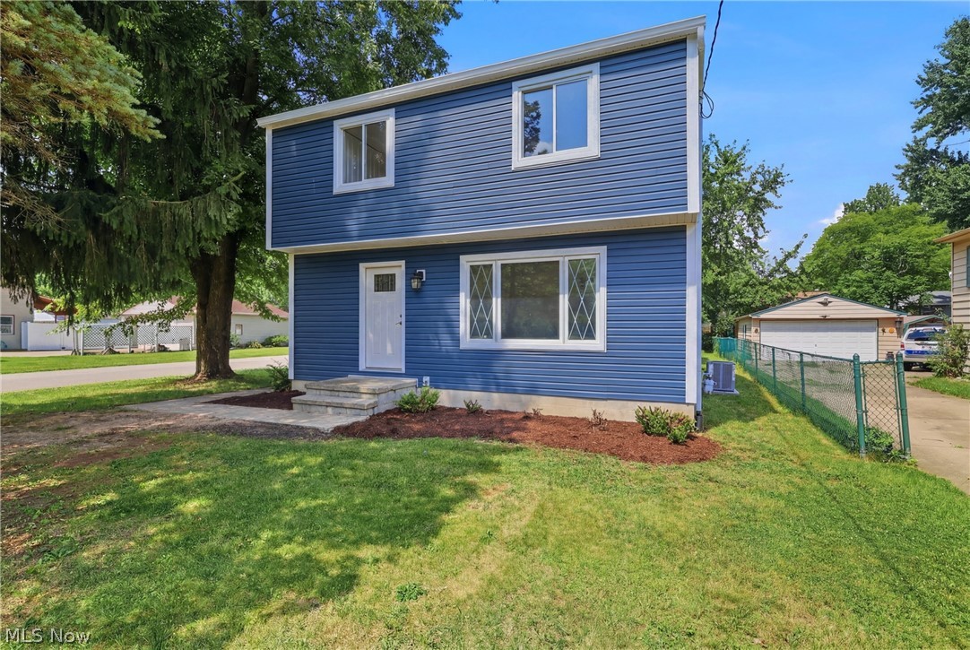 Welcome to this beautifully renovated home in desirable North Ridgeville! Nearly every inch has been updated, offering the style, comfort, and peace of mind of a like-new home. The completely redesigned kitchen has been expanded to nearly double its original size and features brand-new cabinetry, stunning quartz countertops, and plenty of space for cooking and entertaining. The full bath has been completely remodeled with a new walk-in shower, while the updated half bath adds extra convenience. Major improvements include a brand-new roof with new sheathing, new furnace, central A/C, and hot water tank. Luxury vinyl plank flooring flows throughout the main living areas, with brand-new carpet in the bedrooms. Recessed lighting, new ceiling fans, and modern finishes complete the interior. Conveniently located near shopping, restaurants, parks, schools, and entertainment, with quick access to major highways and the Ohio Turnpike, making commuting simple. With virtually every major component replaced, this truly turnkey home is ready for you to move in and enjoy. Schedule your private showing today!