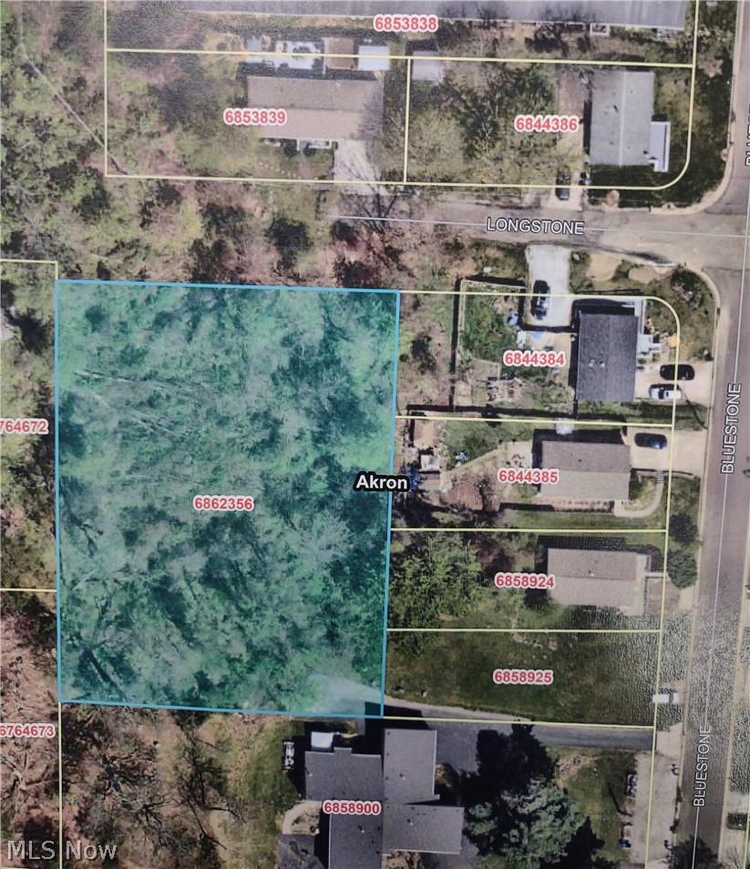 Vacant parcel for new home construction, featuring a hillside setting and 15-year tax abatement on the improved value (new building).  Buyer to verify details of the tax abatement, availability / cost of utilities and new construction requirements.