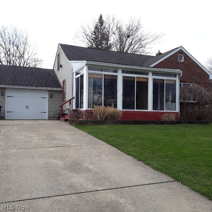 Extremely well cared for charming 3 bedroom, 1.5 bath home.
Numerous updates include a remodeled kitchen with stainless steel appliances, flooring, countertops, stone backsplash, fnew ixtures and expresso cabinets.  The living room features refinished hardwood flooring, large windows and a lovely entry door which leads to an enclosed 3 season patio room adding extra living space to the home.  Updated baths including a new shower wall with a glass block window.  New garage door.  The spacious second floor features a sitting room at the top of the stairs with a spacious cedar closet.  This space could also be a play room, office or sewing room.  In the rear is a huge bedroom with a half bath, a large wall closet, builtin wall dresser and a very large storage closet.  The fenced back yard with a paver patio is covered by a new gazebo.  This home will go fast!