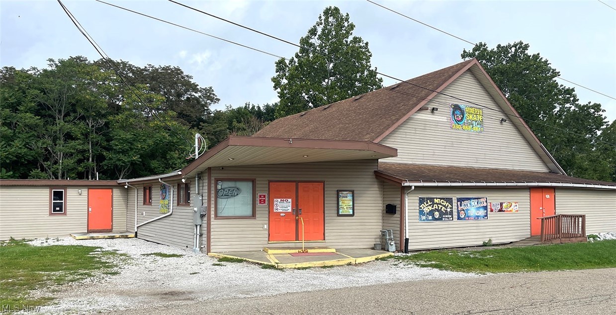 Minerva Roller Rink - Turn Key Business and Real Estate! Successful business with a good clean reputation. The Main Roller Rink building shingle roof is approximately 16 years old, roof over the arcade is rubber, new in October 2021 (5 Star Roofing with 15 15-year warranty). Three gas furnaces and two central air units. City water and sewer. Four tax parcels total 3.57 acres. Very well-maintained property, with the main roller rink floor sanded and refinished in June 2022 by Finchem Flooring. The seller pays for mowing $75 per week. The main building has a roller rink, first-floor arcade room, snack bar, and booths. The finished basement has Lazer Tag Arena (installed in 2020) and a second arcade room. Summer months owner employs 5 workers, winter months 9 employees. Good reputation with local churches and schools for events and birthdays. Large parking area for up to 60 cars. Wooded area at the rear of the building. Located near downtown and schools. Seller Financing Available, $50,000 down payment, 15-year loan, 8% interest, 2-year call date.
