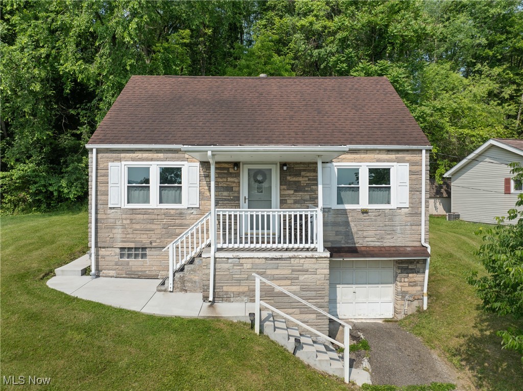 Charming Cape Cod home priced to sell and packed with possibilities! This move-in-ready property is truly turnkey—just unlock the door and make it home. The main level offers a spacious living room, formal dining room, eat-in kitchen, and a convenient main-floor bedroom with a private en-suite bath and sliding glass doors that open to a serene rear patio. Upstairs, you’ll find two additional bedrooms and a full bath, including a generously sized bedroom with a walk-in closet that also houses the laundry area for added convenience. The lower level features a partially finished basement with a recreation room and an additional full bathroom with a shower, providing flexible living or entertaining space. Additional highlights include an attached one-car garage and numerous updates throughout. Previously operated as a successful Airbnb, this home offers strong income potential or makes an excellent full-time residence. Tucked away in a quiet neighborhood while still offering easy access to major highways. Don’t miss this opportunity—schedule your private showing today!