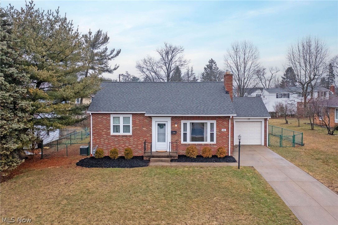 Welcome home to this charming brick Cape Cod offering timeless curb appeal and classic character throughout. Hardwood floors add warmth and style, while the inviting living room features a cozy wood-burning fireplace perfect for relaxing evenings at home.

The bright eat-in kitchen provides a comfortable space for everyday meals. This home offers two bedrooms and one full bathroom, along with a walk-up attic that presents great potential for additional finished living space. The full basement provides abundant storage and room for a home gym or hobby area.

Outside, enjoy relaxing on the patio overlooking the large, fenced backyard. A one car attached garage adds everyday convenience. Schedule your private showing today!