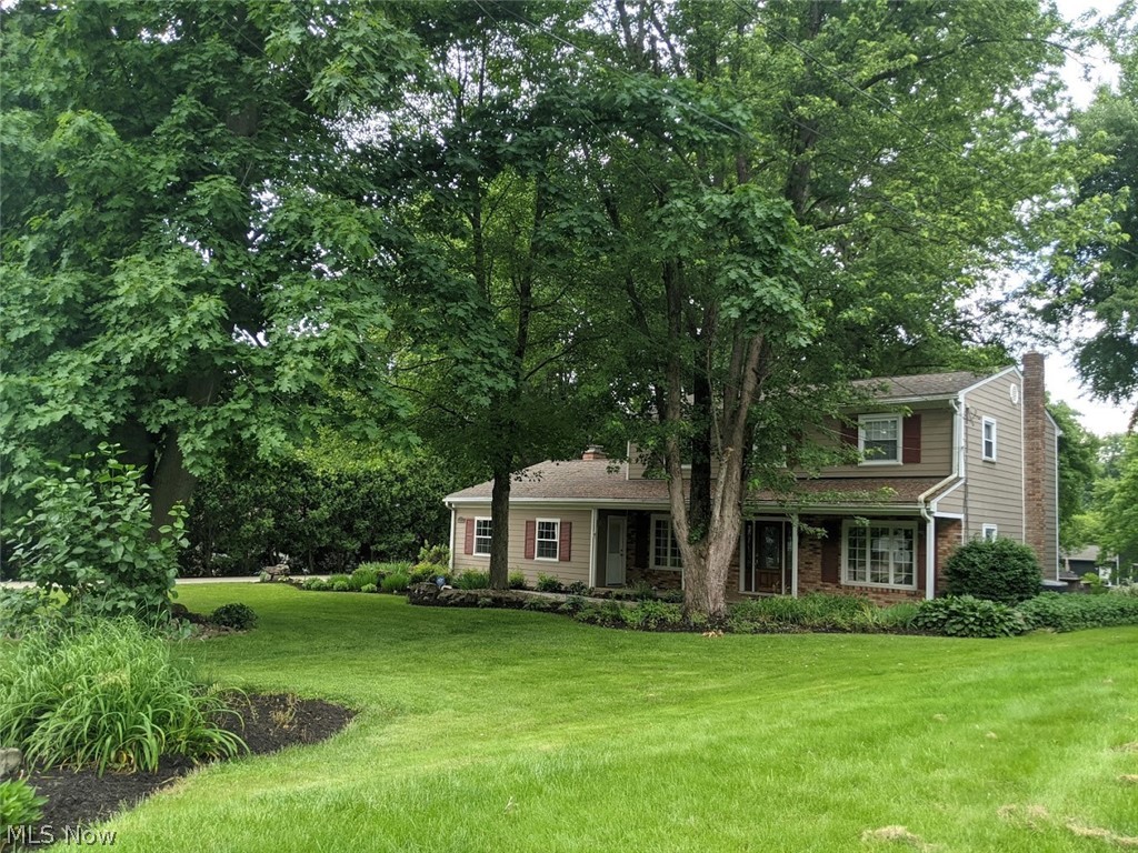 Beautifully maintained colonial in the Copley- Fairlawn CSD is waiting for it's new owners! Fall in love with the outdoor tranquil oasis with firepit, covered patio and chef inspired grilling area on half acre! This home features a car lovers or handyman's dream detached 2 car garage with heat and lighting plus water connection for all those projects and the attached two car garage for your vehicles!  Inside you will find a updated kitchen with all appliances included and island for serving guests with abundance of storage. The living room is very spacious and can accommodate large style furniture! Bedrooms all have large closet space and feature a gorgeous original hardwood flooring! Downstairs features hardwood original flooring as well.  Peaceful front porch with stamped concrete leads to your main entrance into the home as well as the back of home. This home is a must see so don't hesitate schedule your showing today!