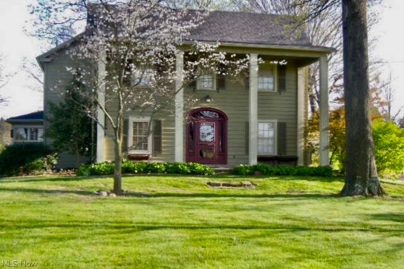 LOVELY GEORGIAN COLONIAL CENTURY HOME!! BEAUTIFULLY REMODELED TOP to BOTTOM!! This WONDERFUL HOME is situated on 3.77 ACRES!! Featuring Living Room with decorative Fireplace, Century front door & crown molding; Kitchen with custom made cabinetry, GRANITE countertops, STAINLESS STEEL appliances, farm style sink & center island; Formal Dining Room with crown molding & French doors; Breakfast Room with bay window; Family Room/Library with gas log FIREPLACE, crown molding & built in shelving; First Floor Bedroom or Office with bamboo flooring & access to Half Bathroom; Master Bedroom with double closets, crown molding & access to Master Bathroom; Two Additional Bedrooms with large closets & built ins; Full Bathroom with SECOND FLOOR LAUNDRY ROOM and Full Basement with Bilko doors for outside access. FANTASTIC CABIN restored for ENTERTAINING with REC ROOM (29x15), BAR, hot & cold water, cable, half bathroom, gas furnace & French doors leading to DECK or PATIO!  CUSTOM BUILT BARN/GARAGE (30x