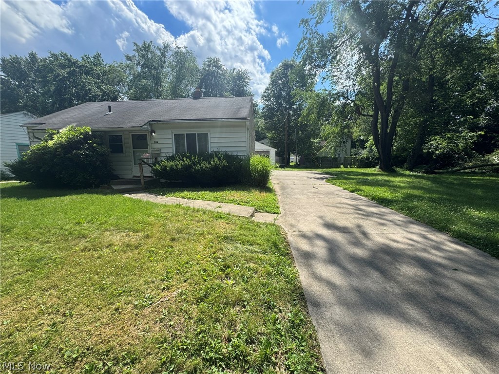 Rehabbers, flippers, and do-it-yourselfers!  Put your finishing touches on this ranch with solid bones!  Located at the end of a dead-end street that backs up to Erie Island park, this home had a basement waterproofing system with sump pump, a high efficiency furnace, updated electrical panel, and double pane vinyl windows.  The first floor features a living room, kitchen, 3 bedrooms and a bathroom with walk-in shower.  The partially finished basement has another full bathroom, recreation room and bonus room with closet that was formerly used as a bedroom. Outside you'll enjoy a stamped concrete patio, back yard, single car garage and vacant lot between you and the park.  Located just minutes from I77.  Call your favorite Realtor and schedule a private showing today!