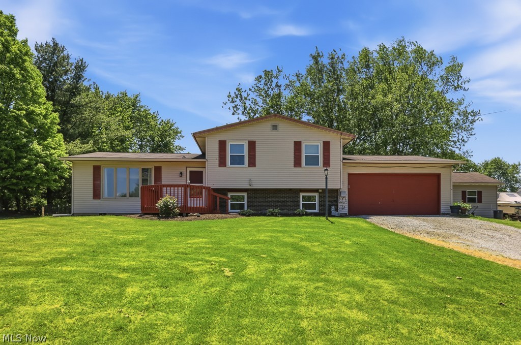Welcome to 10960 Easton — where country charm meets convenience! Situated on 2.11 beautiful acres, this move-in ready split-level home offers the perfect blend of space, comfort, and privacy. Step inside to a bright and spacious open-concept layout featuring 3 bedrooms, 1 full bath, and a welcoming atmosphere that instantly feels like home. The kitchen comes complete with approximately 3-year-old appliances and flows seamlessly into the main living space, making it perfect for entertaining family and friends. Outside, you’ll fall in love with the large corner lot, partially fenced backyard, cozy back patio, and front deck — ideal for enjoying peaceful mornings or summer evenings. Need extra space? The large outbuilding is perfect for a workshop, storage, hobbies, or all your outdoor equipment. An attached 2 car garage and turnaround driveway, provide plenty of room for parking and guests. Enjoy the quiet setting while still having easy access to Alliance, Louisville, and Canton. Homes with this much land, space, and potential don’t come around often — schedule your private showing today before this one is gone!