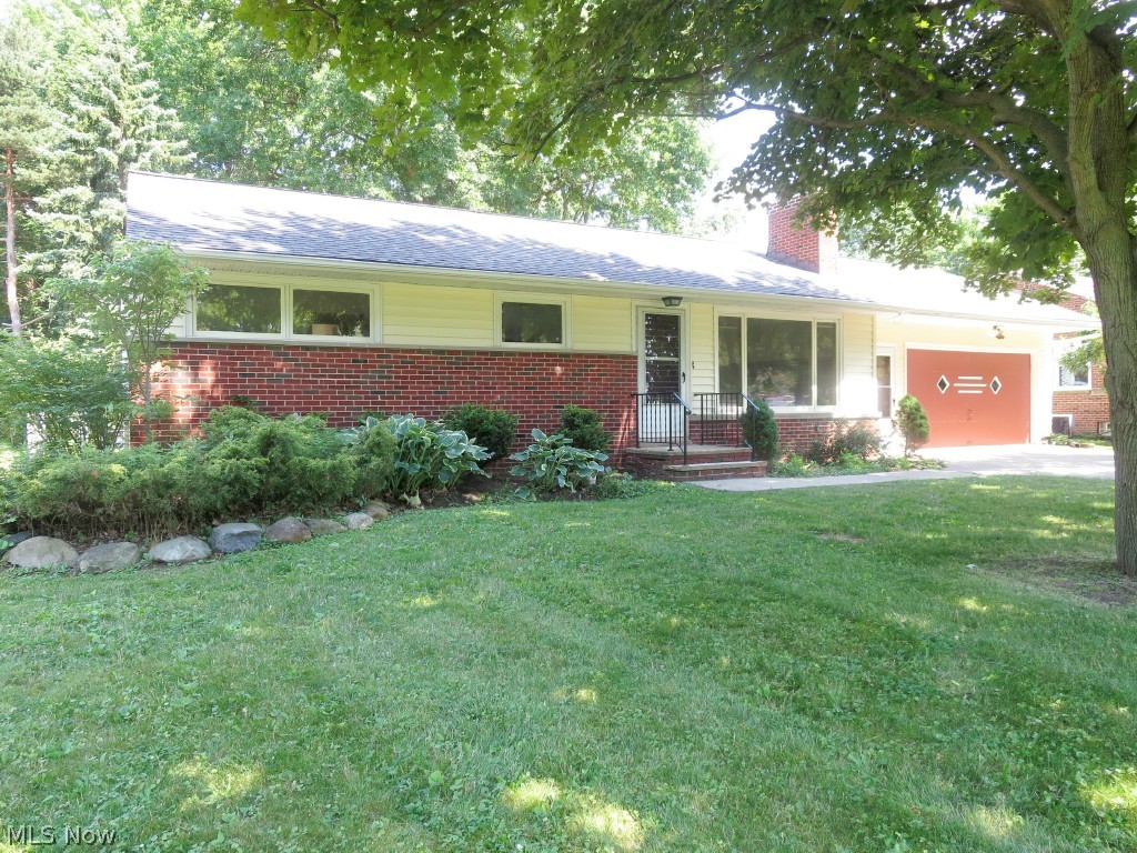 Ranch w/ 1st Floor Vaulted Family Rm. Brick & Vinyl Siding w/ 3352 Total Square Feet including Lower Level. Living Rm w/New Carpet, Fresh Paint, Stone Fire Place. Kitchen w/ Two Skylights for Plenty of Natural Light. Lots of Cabinets and Counter Space, Window to Family Rm above Sink, New Floor. Vaulted Family Rm w/ Floor to Ceiling Stone Fireplace, New Carpet, Fresh Paint, Two Sliding Glass Doors to Large Deck. Three Bdrms all w/ New Carpet & Fresh Paint. Hardwood under Bdrms, Hall & Living Rm.  Updated Full Bath w/ New Tub and Surround, Vanity, Sink, Floor & Commode.  Half Bath on 1st Floor Completely Updated. Large Rec. Rm Area w/additional Fireplace. Third Bath started on Lower Level.  Large Attached Two Car Garage w/ Entrance to Another Garage w/ Over Head Door leading to Back Yard. Shed. Two Parcels included totally 1.57 Acres. T Shaped. Part of Yard Fully Fenced. New Electric and Roof in 2014. Home Warranty.