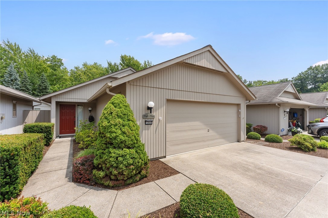 Ready for easy living in a serene and peaceful 55+ community, this rare offering combines comfort, convenience, and exceptional amenities. Residents enjoy access to an indoor heated pool, exercise room, sauna, gathering area, library, and scenic walking paths surrounded by natural beauty and local wildlife. Built by Bob Schmitt, this sought-after, limited-maintenance community features detached, single-story homes designed for effortless living.

Offering over 1,800 square feet, this thoughtfully designed home includes 2 bedrooms and 2 full bathrooms. The spacious great room is anchored by a wood-burning, brick-front fireplace with built-in bookshelves, creating a warm and inviting focal point. Expansive floor-to-ceiling windows flood the space with natural light while overlooking the private courtyard. A rare office/den, unique to this floor plan, provides flexible space for a home office, hobby room, or additional sitting area.

The eat-in kitchen offers abundant storage with 42-inch cabinetry, under-cabinet lighting, ceramic tile backsplash, and generous workspace. The spacious primary suite features dual walk-in closets, granite dual vanities, and a walk-in shower. Neutral décor and recessed lighting throughout create a bright, move-in-ready interior that complements any style.

Additional highlights include a beautiful 15' x 10' sunroom just off the primary suite and an attached extra-deep 2½-car garage with abundant storage. The recently refreshed, private enclosed courtyard provides the perfect setting for relaxing, entertaining, or accommodating pets. Ideally situated on a quiet cul-de-sac near shopping, dining, healthcare, and everyday conveniences.

Schedule your private showing today—this exceptional home is one you won't want to miss!
