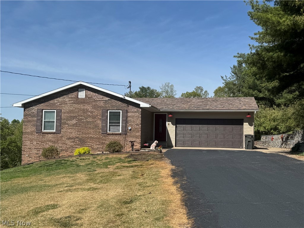 Beautiful 5 bedroom, 3 full bath home, located in Warren Schools is larger than it appears, offers easy access to Marietta, Belpre & Parkersburg, meticulously cared for over the last 40 years by current owner, numerous updates both inside & out and just waiting for you to move in & be its third owner. Light and airy living room, dining room w/picture window overlooking backyard and door to the 16 x 12 covered patio area perfect for entertaining or relaxing. The Dining room is open to the kitchen featuring abundance of Oak cabinetry, "appliance garage" bar area for breakfast, good counter space, coffee bar area and appliances. Spacious master bedroom has plenty of room for large furniture, offers 2 closets & private full bath w/new walk in shower & tile work (2025).   At the opposite end of the hallway is a guest bedroom featuring 2 closets, a home office (could easily be 6th BDRM or be turned into laundry room) and an all new gorgeous full bath (2025) w/skylight and tub/shower complete the main level. If you are looking for a home that could offer an in-law suite then this may be the home you have been looking for…the walk out lower level features new carpeting in 2020 that is like new, 3 bedrooms, updated full bath w/walk in shower, laundry room and family room/rec room area with new French doors (2025) to the backyard.  Are you looking for a “Man Cave/She Shed”….a nice workshop for woodworking….a place to store your ATV or even a vehicle you want to restore???  Then you will love the 24 x 32 2-story garage/workshop located at the rear of the lot with its own electric box, concrete floor, garage door and man door…PLUS a loft area that provides great storage or could easily be finished.  The home has GFA heat with CAC system, new septic system 2020, new roof house & building 2020, windows throughout house, vinyl siding and insulation in 2010, 2 car attached garage, ATV trailer/camper parking beside the house, abundance driveway parking & situated on dead end street.