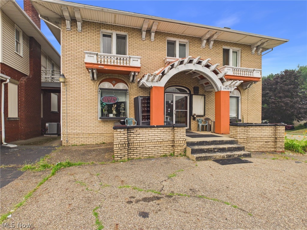 2529 Cleveland Avenue Northwest is a mixed-use, income-producing opportunity with current cash flow and an opportunity to increase revenue. The main level is home to an established, occupied salon that provides steady rent and built-in foot traffic. The upper level features an occupied apartment, offering residential income from day one and a natural live-work or investor setup. Total combined income of $1,500 per month, with both units currently on leases.

Behind the main structure are two additional rear units currently under construction, giving a new owner the chance to finish to taste and significantly increase rental revenue. One former tattoo studio offers a flexible three-room layout plus a bathroom, ideal for a private office suite, wellness services, boutique studio, or another specialty use. The second rear unit is a true studio with one open room and a bathroom, perfect for a solo professional, micro-office, or compact residential rental.

With multiple income streams in place, plus two value-add units in progress, this property is a strong fit for an investor or owner-operator looking to grow returns. High-visibility Cleveland Avenue frontage and mixed-use flexibility combine to create a compelling asset in this price range.