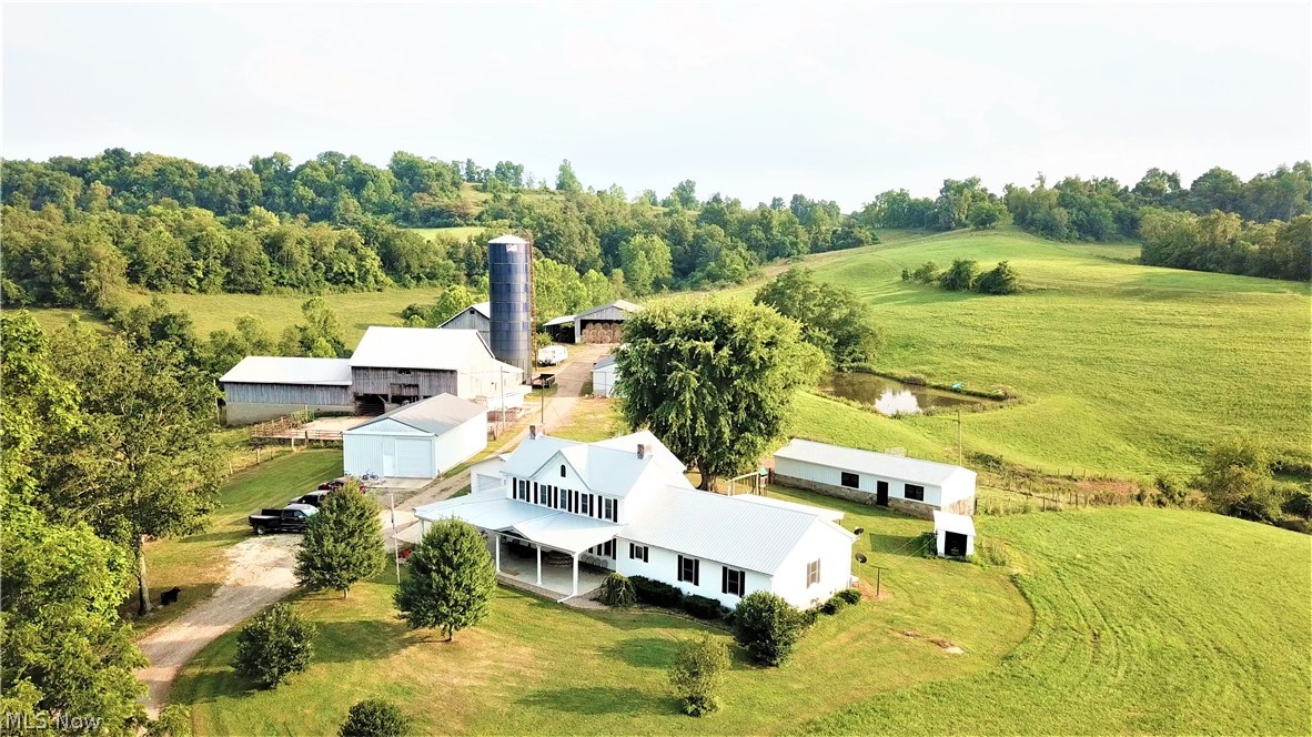 273 +/- acres of land for the farming and/or hunting enthusiast.  The property includes 2 ponds and is fenced for cattle. The original farmhouse was completely restored and added onto in 2011 with new roof in 2019.  Gorgeous woodwork, original staircase, chandelier and fireplace with tasteful updates, (2) Furnaces and A/C units 8 years old, Gorgeous kitchen, custom cabinets and  huge pantry, enormous master suite (over 600 sq ft) and you will not want to leave the master bath including the soaking tub and walk in shower. The buildings have been well maintained with newer roofs and include a 28x48 "Garage Mahal" built in 2012 with concrete floor to store your toys, 40x80 barn with feed lot, 50x70 hay barn with 24x70 lean to, a silo and many other buildings and sheds (a complete list can be obtained from the listing agent).  Home has free gas per owner, mineral rights DO NOT CONVEY.  This property offers fantastic hunting grounds with record breaking animals harvested in recent years.