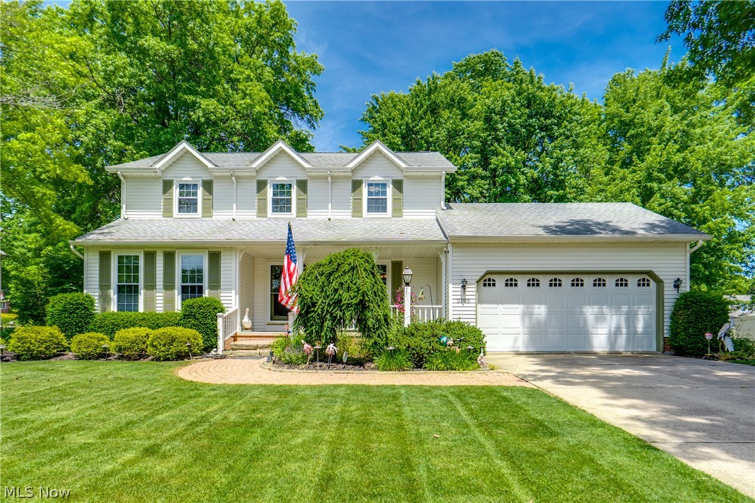 Welcome to this beautifully updated 4-bedroom, 3.5-bath Colonial! From the moment you step inside, you'll notice the care that has gone into this home. The redesigned main level impresses at every turn. The heart of the home is a gorgeous, fully updated kitchen featuring white cabinetry, quartz countertops, a farmhouse sink, and a pantry — all opening to the backyard deck via French doors, perfect for entertaining. The spacious family room offers warmth and character with a gas fireplace and brick surround, while a separate parlor/office with its own French doors provides the ideal work-from-home space. Laminate hardwood flooring flows throughout the main level, and the convenient first-floor laundry in the 1/2 bath rounds out this thoughtfully designed floor plan. Upstairs, the primary suite is a true retreat with French doors leading to a private en suite bath featuring a skylight, a low-lip tile shower, and a walk-in closet. Two additional bedrooms, each with a double closet, share a hall bath with a tub and shower. The partially finished basement adds a fourth bedroom with an egress window, plus a full bathroom with a tile shower and glass door. Outside, enjoy a fully fenced backyard with a wooden deck and tons of yard space. Peace of mind comes standard with major mechanicals all recently replaced: Roof (2020), Furnace (2020), Hot Water Tank (2020), AC (2025), updated Pella windows throughout, and a double sump pump with battery backup. Don't miss your chance to see this beautiful home; schedule your showing today!