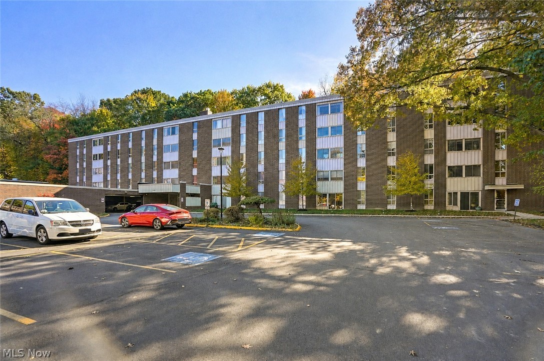 Welcome to this updated and absolutely gorgeous 2-bedroom, 1-bath condominium in the highly desirable, maintenance-free Silver Lake Towers!  The stunning kitchen is totally updated and features beautiful soft-close cabinetry, granite countertops, stylish backsplash, and stainless steel appliances. The updated bathroom offers a walk-in shower and granite vanity. The open-concept living and dining room combination offers plenty of space for entertaining or everyday living. Sliders lead to a relaxing three-season room, the perfect spot to enjoy your morning coffee, read a book, or take in the changing seasons. The spacious primary bedroom provides exceptional storage with a large walk-in closet plus an additional closet. New windows throughout the unit, fresh paint and professionally cleaned carpeting add to the home's pristine condition.    This condo is move-in ready with nothing to do but unpack and enjoy.  Garage space #143, storage unit #6 are included.  Monthly fee includes ALL utilities even WIFI and Cable.  Updates made in 2023.