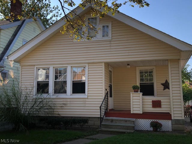 New Price/New furnace! Experience all of the old world charm of this lovely Cape Cod. 2 bedrooms and 1 full bath, but plenty of space on the third floor to expand. Enter from the tree-lined, brick street onto the comfortable front porch. Original hardwood floors and 10 foot ceilings will greet you upon entering the home. Natural light pours into the spacious living room. A large dining room with built-ins and a window seat connect the living room to the kitchen. The kitchen offers all appliances to the new owner, new counter top and backsplash along with plenty of storage. You will even notice the concealed ironing board behind one of the stenciled cabinet doors. The third floor is just begging to be finished with your own special style! The basement includes a brand NEW furnace, laundry, a storage room with shelves and a work bench area. The back yard is completely fenced in and ready for entertaining. Halloran Park is at the top of the street for you to enjoy. Please see the list of