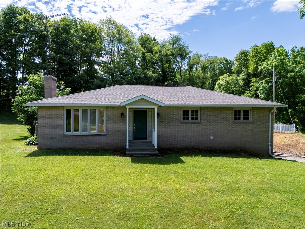 Situated on just over 5 scenic acres, this solid all-brick raised ranch offers the perfect blend of country living and everyday convenience. With great bones and endless potential, this well-built home is ready for its next owner to add their personal style and finishing touches.  The main level features three bedrooms and a full bath, with one bedroom currently serving as a convenient first-floor laundry room that can easily be converted back to a bedroom if desired. The recently remodeled kitchen provides a fresh, updated space for cooking and gathering, while the spacious living areas offer a comfortable layout for everyday living.  Outside, you'll appreciate the attached two-car garage along with an impressive 36' x 48' outbuilding with water and electric—ideal for hobbies, equipment storage, workshop space, or recreational vehicles. The beautiful 5+ acre setting provides room to roam, garden, or simply enjoy the peaceful surroundings.  Whole house generator will stay and home features FREE GAS possible! Upadated roof shingles in 2024 and updated water heater 2026.

If you're looking for a quality-built home on acreage in a convenient location, this is an incredible opportunity to create your dream country property.