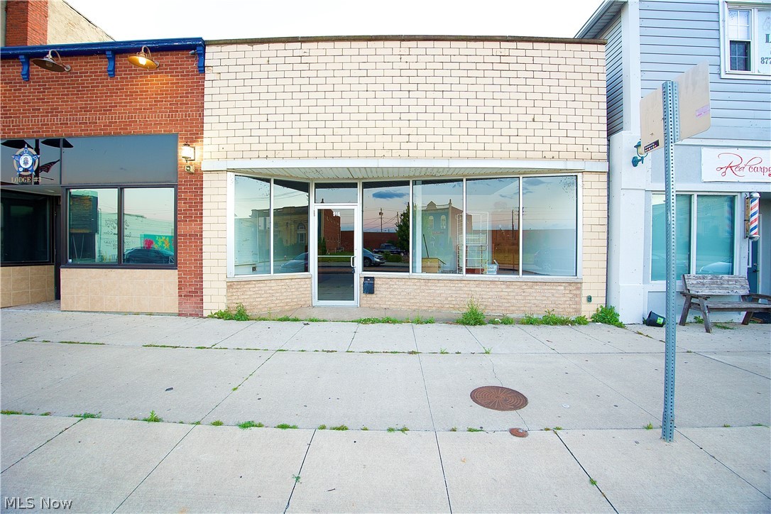 Located in the center of downtown Lorain, just a few buildings down from the famous "Broadway" sign. This versatile commercial property features over 3,500 square feet of functional space ready to fit a variety of business needs. Expansive storefront windows provide excellent exposure and signage opportunities, while convenient rear garage access adds flexibility for operations and deliveries. Suitable for retail, office, showroom, studio, or creative ventures, this property benefits from strong downtown activity and consistent pedestrian traffic. A rare opportunity to customize a spacious location and establish your business in one of Lorain's most visible commercial districts.