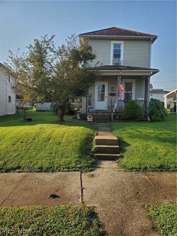 Check out this 2 Bedroom home with many updates.  Kitchen has new Kitchen Cabinets & Sink. Bathroom updated with new Shower/Tub, Vanity & Sink. Home has been painted throughout. New laminate flooring on main level.  Plumbing updated and New Rheem Furnace and A/C added in 2020!  The backyard has a fenced in area and Outside building w/electric.