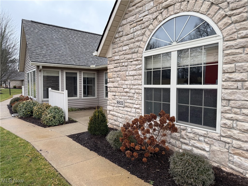 This spacious open concept Scotsbury Green Condo is in a premium location that provides maximum privacy. You enter through your own patio into the huge great room with cathedral ceilings. You have a generous and fully applianced kitchen with plenty of cabinets and counters and a breakfast bar. You can also invite the whole family to eat in this dining room. Mornings will be spent in the 4-season Sunroom enjoying coffee or reading your favorite book. The master suite is complete with its own full bath and a walk-in closet. The 2nd bedroom also has a walk-in closet and access to the sunroom. The laundry room is equipt with a utility sink and the garage is super-sized. Updates include Dishwasher 2018, Air conditioner 2018, Water heater 2019, LVP Flooring 2019, Kitchen sink and faucet 2019, Fridge, Range, Microwave 2021, Roof 2025. Water and Sewer are included in the HOA Fees. This is one you better check out!