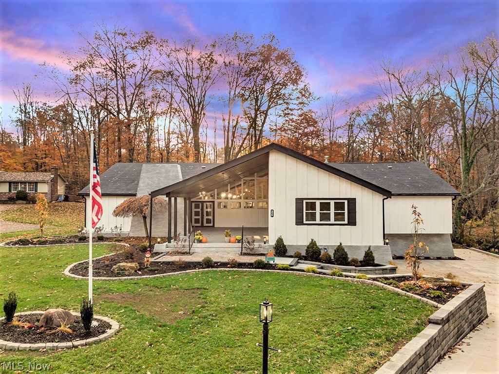This breathtaking 5,500+ sq ft Camelot Court home has been completely remodeled with the highest quality craftmanship.  All of your buyers’ desires are to surely be met throughout this home. It features a lavish master bedroom with ensuite and a full walk-in closet.  Two Full Kitchens!!  It features an in-law suite with private entrance and private parking space.  Basement is set up for an in-home movie theater; designed for entertaining.  A full kitchen, stainless steel appliances, and a granite bar look out wall to wall windows to the ultimate backyard oasis.  A custom stamped concrete patio, spiral staircase and firepit seating finish off this ultimate entertaining experience.  Just too many updates to list but, please don't forget to push on the bookcase in the laundry room; opening a secrete passageway to a hidden room!!