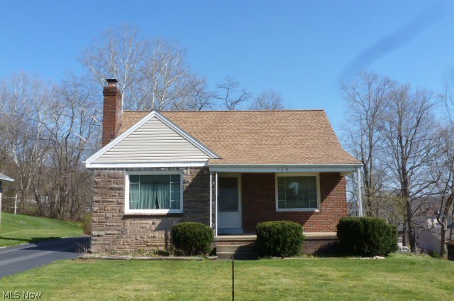 Super curb appeal for this well built family owned all brick Cape Cod. Setting on five lots, this home features a spacious living room with a stone fireplace, hardwood floors, additional living space off kitchen, full basement including a recreation room. Also, a large 2 1/2 car detached garage and wooded backyard. Includes updated dimensional roof shingles, vinyl windows, furnace, central air, and hot water tank. Immediate possession.