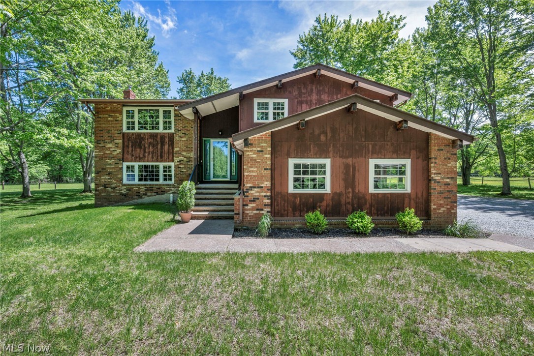 Nestled on over 5 picturesque acres, in Leroy Township, this exceptional property offers a rare blend of privacy, serenity, and modern functionality, all just 1.5 miles from I-90 for effortless commuting.
This warm and inviting 2300 sq ft home welcomes you with a bright foyer that opens into a sun-filled living room with vaulted ceiling. The eat-in kitchen includes all appliances and flows seamlessly to a two-tier deck overlooking the tranquil landscape - perfect for morning coffee or evening gatherings.
The home features 3 bedrooms and 3 full bathrooms, each thoughtfully updated. The primary suite includes a beautifully refreshed ensuite bathroom. The lower-level family room, complete with a wood-burning stove, offers a cozy retreat and direct walkout access to the lower deck and backyard. A spacious laundry/mudroom connects directly to the attached 2-car garage, adding everyday convenience. Fresh paint throughout enhances the home?s bright, clean feel.
Outdoors, the property truly shines. A 28×28 detached garage with Lean-To provides ideal space for a workshop or extra storage for equipment and recreational toys. A separate barn with 3 horse stalls makes this a fantastic option for hobby farmers or equestrian enthusiasts. A peaceful pond completes the setting, creating a private rural retreat with modern comforts.
This unique property blends natural beauty, practical amenities, and unbeatable location. This is more than a home; it is a private retreat, a place where rural charm meets modern convenience.