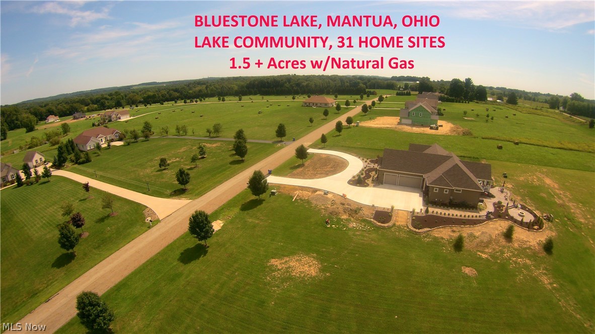 Get ready to build the home of your dreams.  Westside on Bluestone Lake Drive.  Many lots to choose from all over 1.5 Acres.  Only 6 minutes from Aurora, Streetsboro or Mantua.  New construction is in full swing, now is the time to reserve your lot.  Featuring: Gas, Electric, Cable, Paved Streets, Underground Utilities and Storm Sewers. 40 Acres of green space and a 7 Acre shared Community Lake.  Homeowner-centric development all designed around breathtaking, private and awe-inspiring countryside views.  Deed restrictions.  Call today, start your construction now.