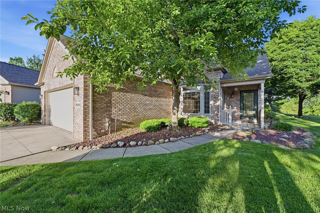 Welcome to this beautifully maintained 2,036 sq. ft. Cape Cod-style home located in the sought-after Waterford Reserve community in Strongsville, offering a main-level primary suite with walk-in closet, 2.5 baths, a dramatic double-sided stone fireplace, and a bright eat-in kitchen with a bay window that floods the home with natural light. Additional standout features include a spacious four seasons room with high ceilings, an oversized loft that can easily be converted into a bonus bedroom, and an attached two-car garage. AC new in 2025.  Thoughtfully designed for comfort and everyday living, the home also showcases soaring ceilings, wood-framed windows, built-in bookcases, and a striking wooden spiral staircase that adds architectural charm.

Designed with comfort and functionality in mind, the main level includes two bedrooms total, highlighted by the private primary suite with a double vanity bath, along with a convenient laundry room featuring a sink. The living and family rooms are anchored by the stunning two-sided stone fireplace with raised hearth, creating a warm and connected flow throughout the home. Upstairs, the large loft offers flexible space for a home office, playroom, or additional bedroom.

Set on a peaceful cul-de-sac, enjoy maintenance-free living with lawn care and snow removal included, allowing for more time to relax and enjoy the community. The attached garage is heated and features epoxy flooring along with plenty of additional storage space, adding both convenience and function. Outside, mature trees surrounding the property provide a natural sense of privacy and a peaceful setting.

Perfectly located near Strongsville’s top amenities including shopping, dining, and entertainment at SouthPark Mall and outdoor recreation at Mill Stream Run Reservation, this home also offers quick access to I-71 and the Ohio Turnpike for an easy commute while maintaining a quiet, residential lifestyle.